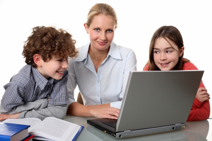 Teacher and students at computer